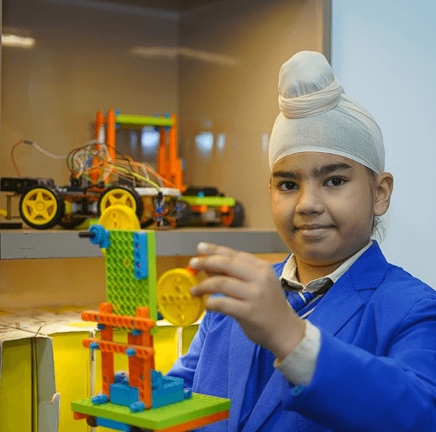AIS students working on robotics projects